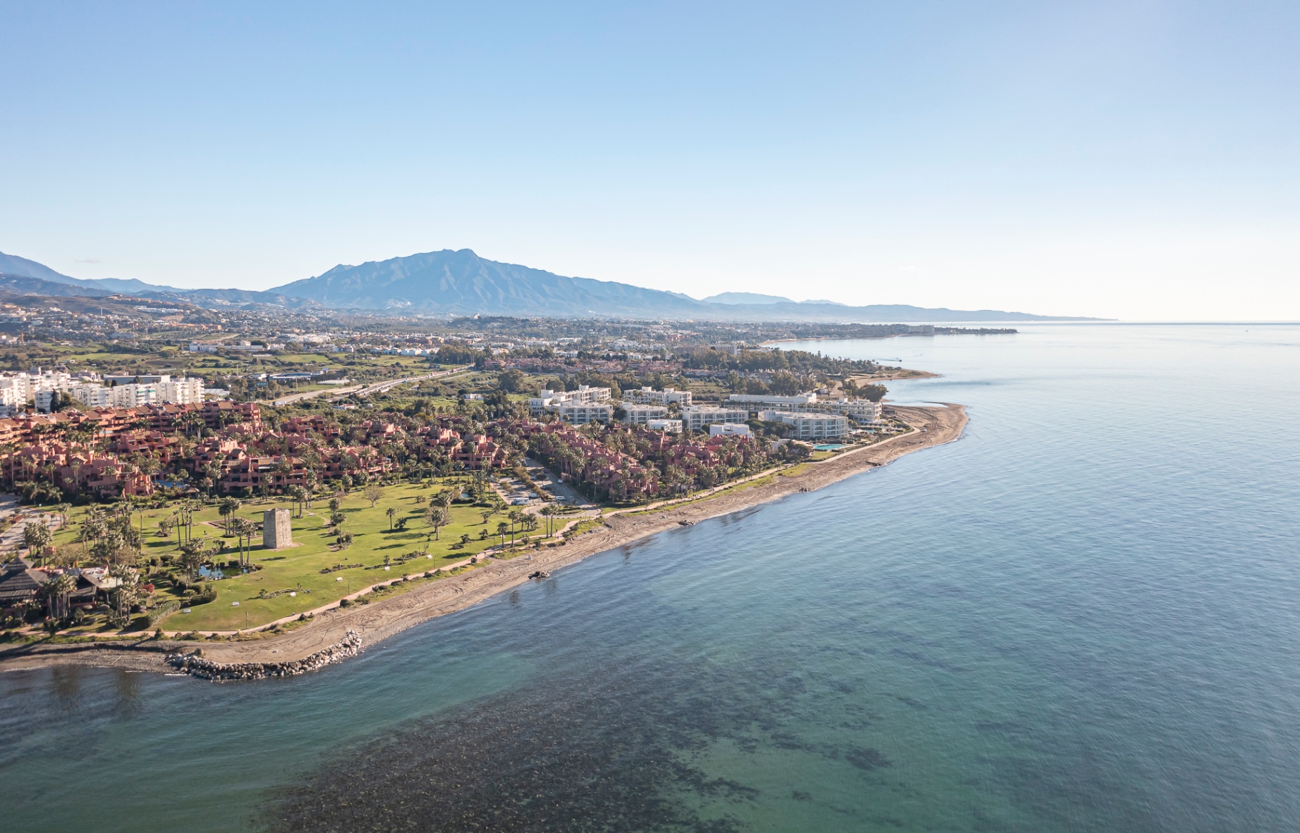 Aerial view of Estepona's New Golden Mile beachfront community.